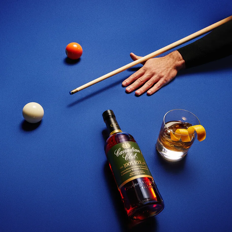 Billar and 100% Rye bottle Canadian Club
