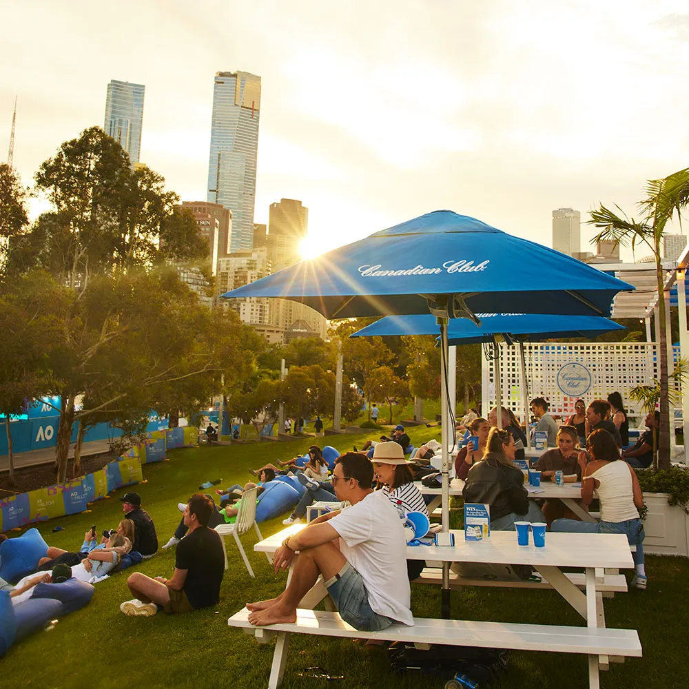people-park-sunset-drinking-canadian-club